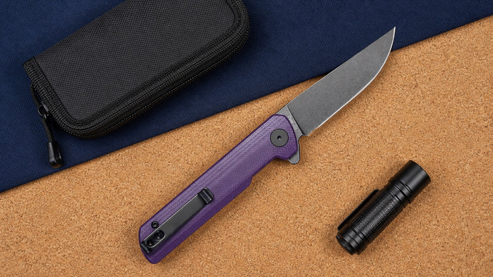 Open purple HOPIAN Clave knife with a compact pouch and flashlight