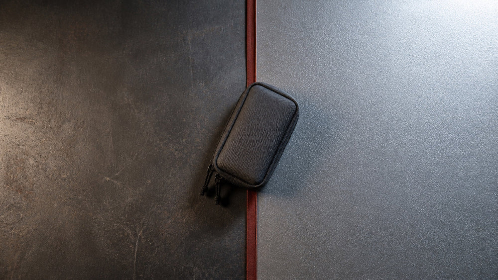 Dark D2-style and bright AR-RPM9-style steel surfaces divided by a red channel
