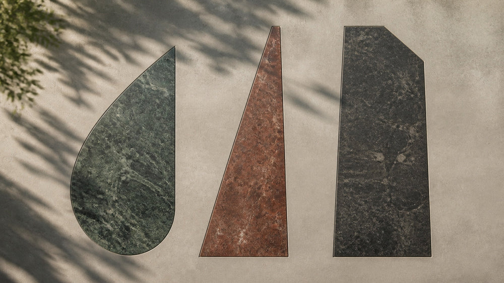 Three integrated stone forms representing rounded, straight, and broad blade profiles