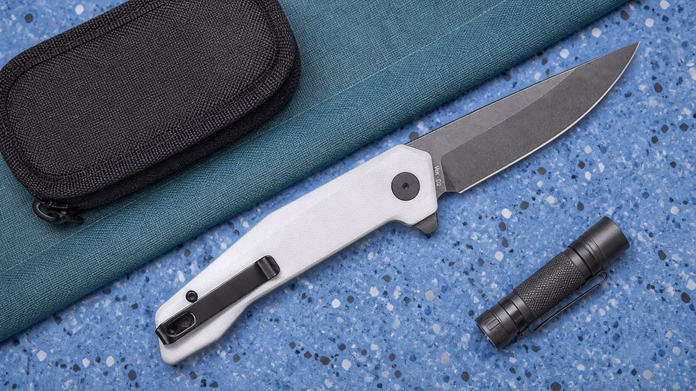 Open white HOPIAN Vex knife with a protective pouch and compact flashlight