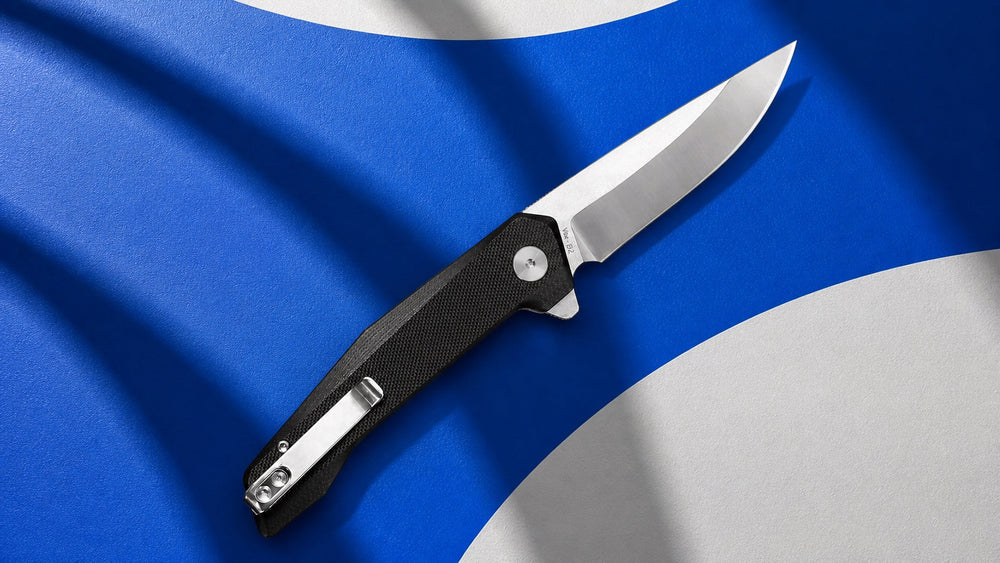 Open black HOPIAN Vex knife with its flipper tab visible on a kinetic blue background
