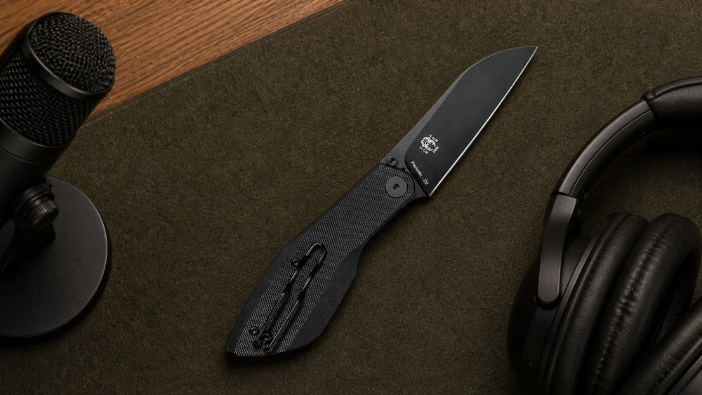 Open black HOPIAN Periodic knife with a microphone and headphones for a design interview
