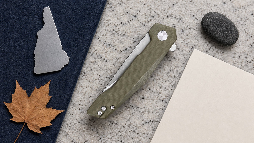 Closed green HOPIAN Vex knife in a neutral New Hampshire legal research scene