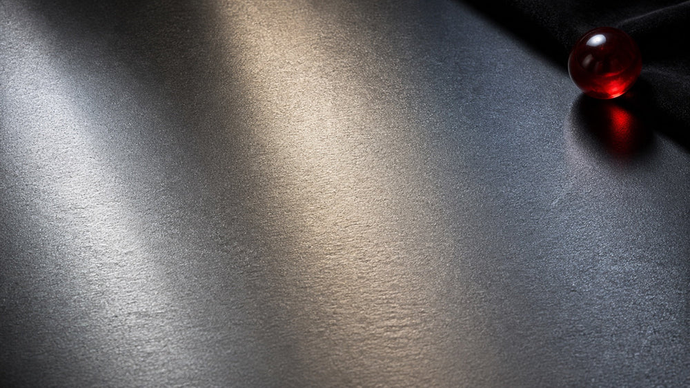 Continuous steel surface under three premium lighting tones for a steel comparison